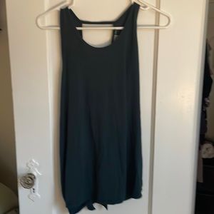 Dark teal tank with cronies cross detail in the back. Excellent condition.